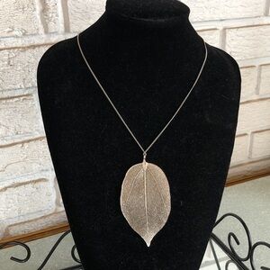 Silver leaf necklace chain is 38” plus 3” extender